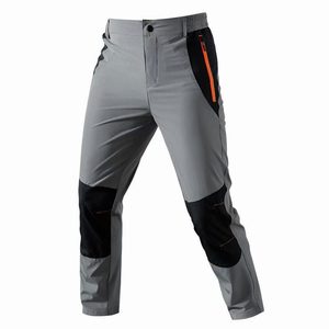 กางเกงเดินป่า SFB123 น้ำหนักเบา ยืดหยุ่นได้ สำหรับผู้ชาย สีกากี ผ้า softshell ป้องกันหัวเข่า พร้อมซิปกระเป๋าข้าง สำหรับตั้งแคมป์และปีนเขา - Product Image 6