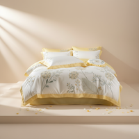Parure de lit 100S Lenzing Lyocell jaune en soie glacée brodée pour un sommeil nu, drap-housse inclus