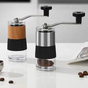 Venta de fábrica Molinillo de café manual portátil de acero inoxidable con núcleo de cerámica y molinillo de café manual de ajuste ajustable