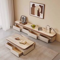 Table basse de style vintage en noyer avec plateau en travertin, idéale pour les petits appartements, design simple et moderne.