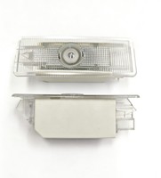 Projecteur LED universel 12V pour portière de voiture, avec lentille HD transparente, boîtier blanc, étanche et fixation par clip, éclairage de bienvenue et de zone.