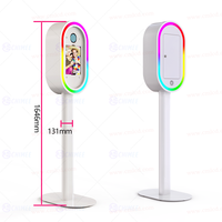 Machine Photobooth Ovale pour iPad, Kiosque Selfie DSLR avec Éclairage LED RGB et Flight Case pour Événements sur les Réseaux Sociaux