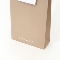 Sac cadeau en papier ivoire écologique personnalisé pour vêtements, bougies et emballages artisanaux avec poignée de longueur d'épaule