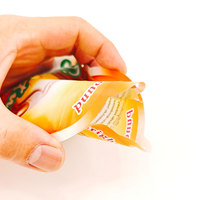 Sachet alimentaire vertical en matériau souple avec impression personnalisée et fermeture sécurisée pour la vente en gros de snacks, bonbons, café, thé et produits secs
