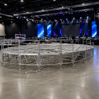 Plateforme de scène en alliage d'aluminium antidérapante noire 4x4 pieds, design double couche élégant pour concert DJ, capacité de charge de 750 kg, utilisation en extérieur