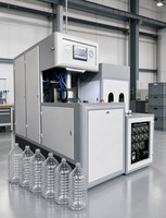 Machine de soufflage semi-automatique économique pour PET et PP, entraînée par un moteur PLC, pour la production de bouteilles en plastique de 10 L