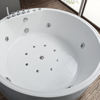 Baignoire ronde autoportante en acrylique moderne avec massage à air intégré pour usage intérieur, capacité 1 personne, pour hôtel et villa
