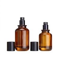 Vente en gros de flacons de parfum en verre de marque luxueuse, flacon de parfum rond en ambre, flacon de parfum personnalisé avec boîte de luxe
