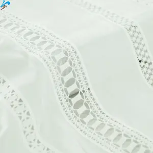 Tela de corte soluble en agua de algodón 100% personalizada de alta calidad, tela bordada de encaje de flores de Color blanco suave para la confección de vestidos