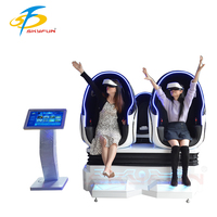 Chaise commerciale d'oeufs de VR à 2 places 9D simulateur de cinéma station de jeu de réalité virtuelle centres commerciaux extérieurs à pièces fabriqués sur PC