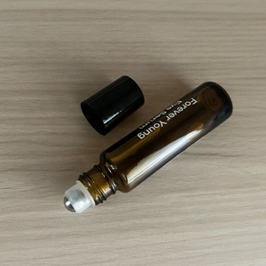 Rollo de hierba de vidrio transparente redondo inferior de base pesada de 10 ML en botella de Perfume con rodillo de acero inoxidable y tapa negra - Product Image 6