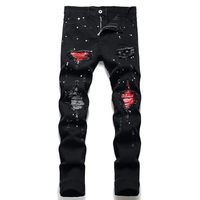 Jean slim déchiré pour homme avec patchs, coupe fuselée, en denim extensible et élastique