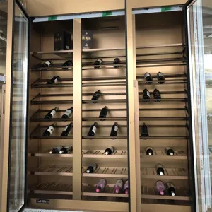 خزانة زجاجية لعرض الويسكي ذهبية/سوداء غير لامعة مخصصة من المصنع ثلاجة نبيذ أثاث بار أو مطعم مجمد خمور عصري
