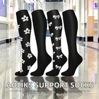 Chaussettes de compression tricotées mi-hautes pour hommes et femmes |   Soutien respirant pour la course à pied, les voyages et le quotidien |   Logo personnalisé pour le bas du corps/le corps entier ODM |