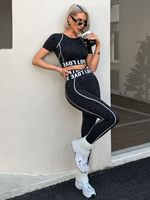 Ensemble de sport sans couture motif léopard noir avec haut court à bande LOVE et leggings taille haute à passepoil contrastant pour femme, extensible, tenue de sport