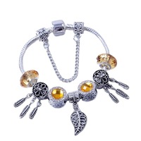 Bracelet en alliage doré avec perles de cristal, opale, attrape-rêves et feuille ajourée pour femme et couple
