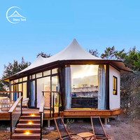Tente de glamping de luxe résistante aux intempéries, type maison, avec structure en acier et membrane PVDF, pour retraite de vacances