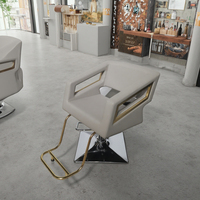 Nouveau produit Chaises de barbier en cuir gris Sulin avec tabouret doré pour salon