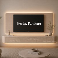 Console murale Cinewall Japandi incurvée, meuble TV flottant beige clair avec portes en relief 3D et panneau mural rétroéclairé par LED