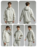 Veste technique à capuche pour homme Coupe-vent zippée Légère Multi-poches Urbaine Extérieure