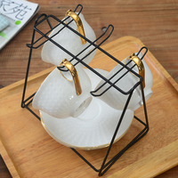 Vente en gros triangle bon marché métal noir 6 crochets rangement pour soucoupe tasse à thé de bureau support pour tasse à café support pour tasses support pour cuisine