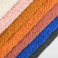 100% recycler le matériel Polyester Faux Sherpa polaire doublure courte Pile fausse fourrure peluche polaire tissu pour vestes doublure tissu
