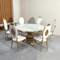 Ensemble de table à manger moderne de luxe avec plateau en marbre, base dorée, chaises rembourrées blanches sculptées pour appartement, villa, hôtel, salle à manger personnalisée
