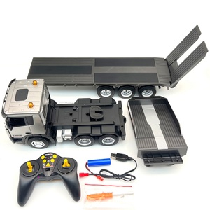 Camión Remolque RC Huina 1318 de Construcción con Plataforma Plana, Control Remoto de 9 Canales 2.4Ghz, Escala 1:24, Alcance de 20-100m, Listo para Usar - Product Image 1