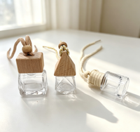 Bouteilles diffuseurs de parfum pour voiture personnalisées en gros – Désodorisants suspendus en verre transparent/coloré de formes variées
