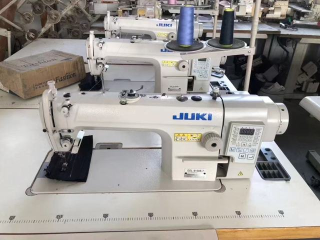 Used JUKi DDL-8700-7 Ultra-high-speed Single Needle Flat Sewing Machine with 4500 STI/Min and 7mm Thickness