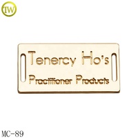 Étiquettes personnalisées ovales en métal moulé sous pression avec logo en relief, accessoires de vêtements, plaque d'étiquetage en alliage métallique pour la décoration des jeans