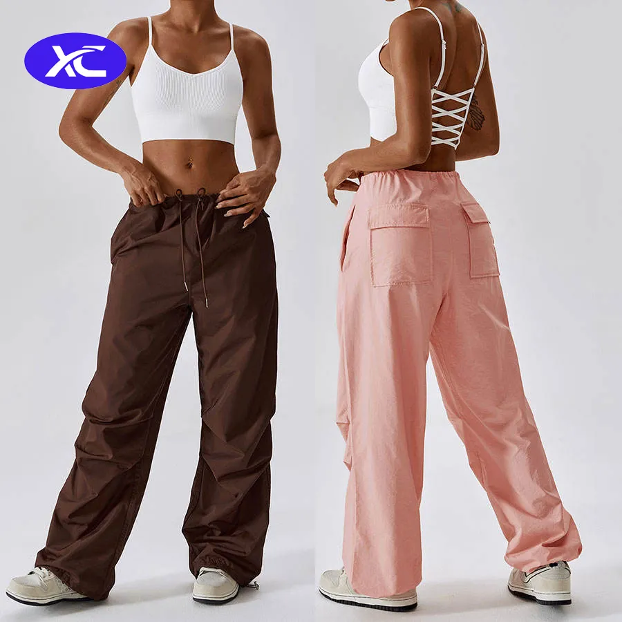 Calças de suor soltas personalizadas de cintura alta com bolsos Calças retas Cargo de nylon rosa para mulheres