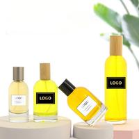 Haute Qualité 30ml 50ml 100ml Verre Rechargeable Unique Forme Ronde Clair Brun Vide Premium Bouteille De Parfum