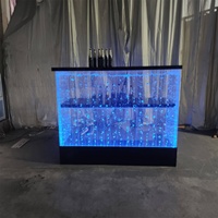 Fonction d'eau personnalisée en tant que table de comptoir de réception LED avec télécommande