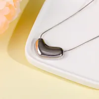 Collier élégant avec pendentif cœur plaqué or 18 carats, chaîne en acier inoxydable, collier ras du cou pour femmes