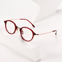 Monture de lunettes à monture ronde en titane rouge ultra-léger à la mode Montures optiques de myopie transparentes unisexes Lunettes de vue en gros