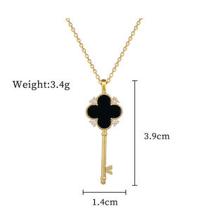 Collar de llave de flor de cuatro hojas blanco y negro bonito de acero de titanio chapado en oro collar de llave de la suerte de acero de titanio - Product Image 6