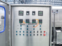 Machine de nettoyage double voie pour bacs à déchets, cages avicoles, caisses de transport de volailles et plateaux de cuisson