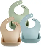 Babero de silicona personalizado sin bpa para alimentación de bebé, babero de silicona liso flexible con brillo en blanco para comida de recién nacido