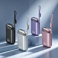 Batterie externe portable Z2 à charge rapide bidirectionnelle 10000 mAh avec câbles intégrés doubles – Indispensable pour les voyages