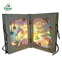 Noël 3D lumière LED Paulownia contreplaqué forme de livre multicolore matériau naturel Art décoratif peinture conception pour dessus de table