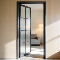 Puerta francesa de aluminio con rejilla hueca y vidrio esmerilado degradado para estudio privado