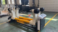 Soporte de rollos hidráulico sin eje doble para fábrica de papel, línea de producción de cartón corrugado, máquina desbobinadora de papel virgen, OEM disponible
