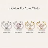Bague en acier inoxydable avec zircon et trèfle à quatre feuilles, design de luxe ouvert, bague élégante personnalisée pour femme avec pierres précieuses.