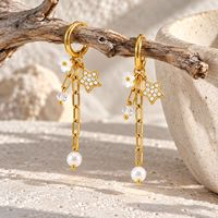 Boucles d'oreilles pendantes en acier inoxydable plaqué or 18 carats avec étoile, zircon et fleur pour femme
