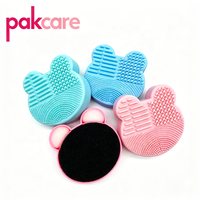 Boîte de nettoyage pour pinceaux à maquillage, pratique et portable pour les femmes.