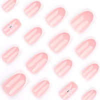 Vente en gros usine Faux ongles français blancs nude avec motif nœud et décoration diamant, design nail art, ongles carrés courts à presser