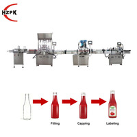 Ligne de production de machines de remplissage, de bouchage et d'étiquetage automatiques HZPK pour liquides et pâtes, pour les produits alimentaires, les cosmétiques, les crèmes, les boissons, les détergents en bouteille