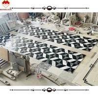 Carreaux de sol en marbre moderne avec incrustation de marbre noir assorti blanc pur personnalisé, motif de jet d'eau