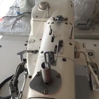 Machine à coudre industrielle informatisée Juki 3200S d'occasion pour boutonnières, blanche, 220V, garantie 1 an, bon état